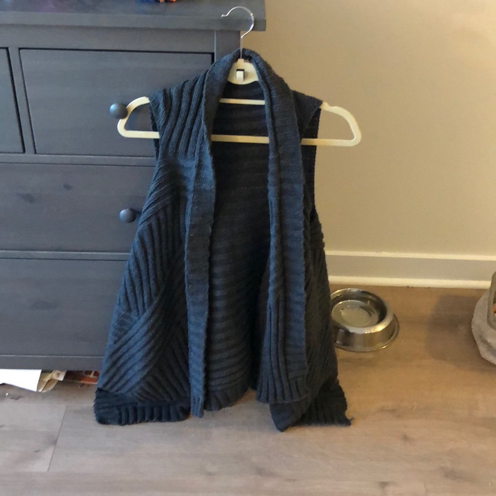 Long, flows, sweater vest. Staccato brand